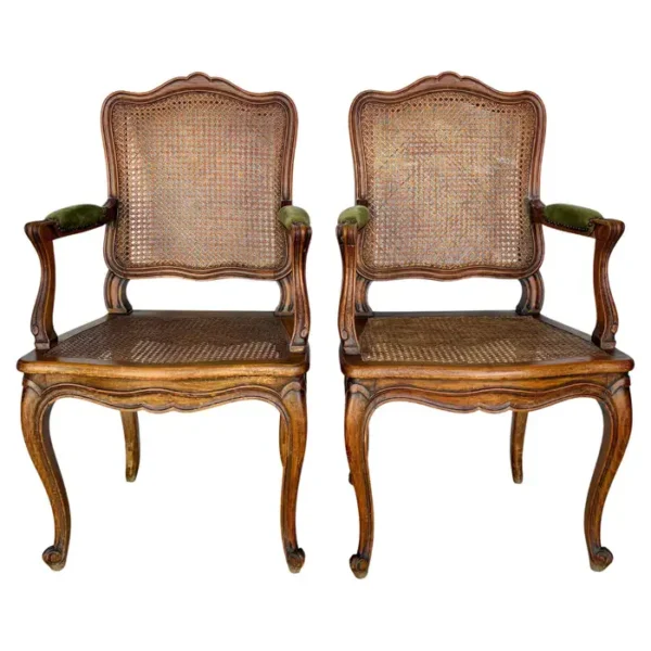 Early 20th Century French Louis XV Walnut and Caned Armchairs - a Pair